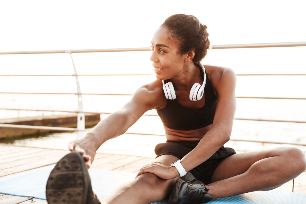Black woman forming good habits by exercising